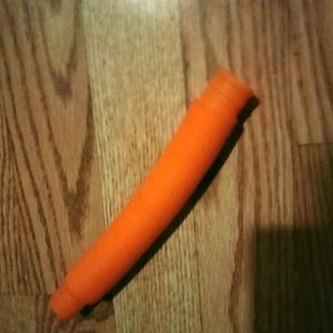 Orange pop tube